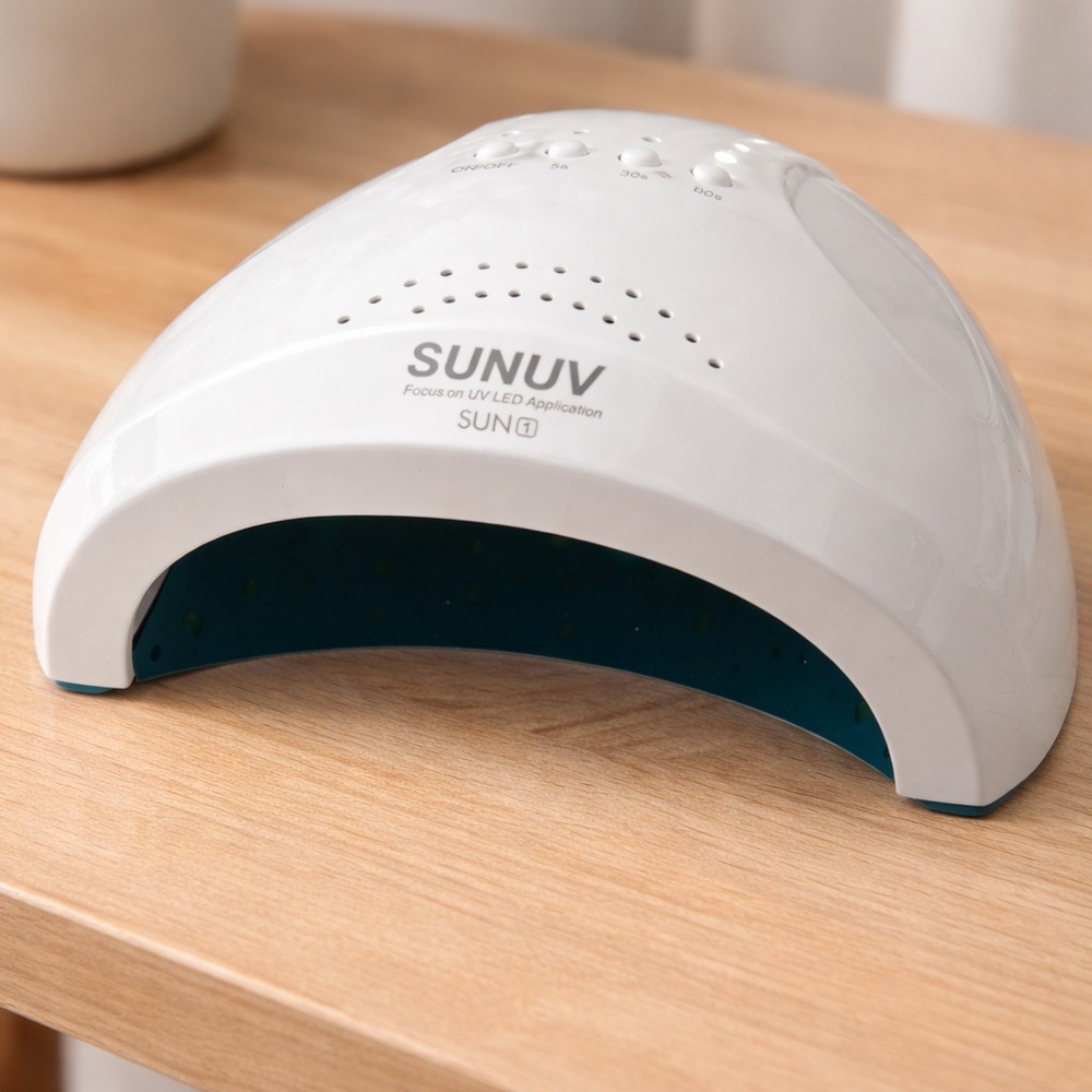 SUNUV SUN1 LED Nail Lamp - White with Teal Interior. Used a few times. Like new